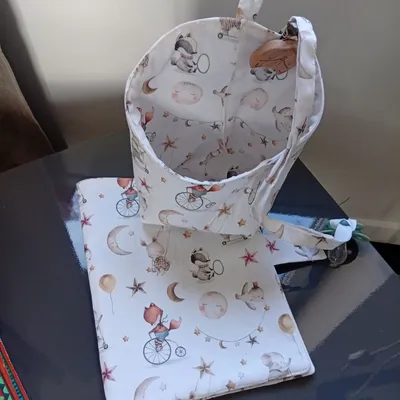 Protège carnet santé panier suspendu et attache tétine 